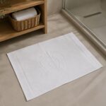 БЯЛА ХАВЛИЕНА КЪРПА ТИП СТЪПКА 550 гр/м2 - 50/55см.